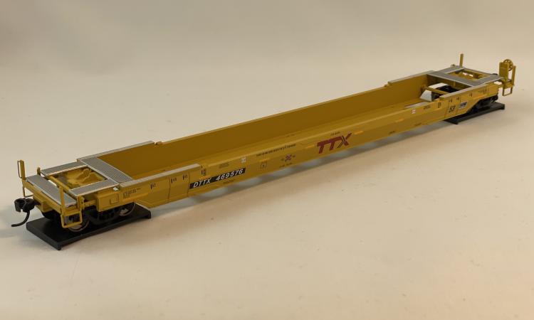 Walthers Proto - Gunderson Rebuilt 53' Well Car - DTTX #469576 (TTX Yellow - Small Railbox Logo) - Sold Out