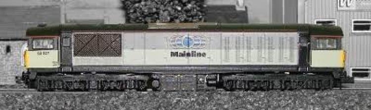 Class 58 No. 58027 in Mainline Triple Grey livery