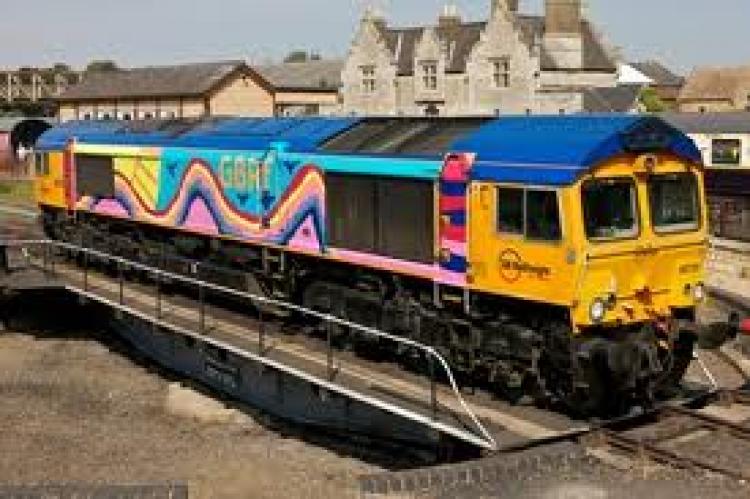 Class 66 in Childrens livery - powered